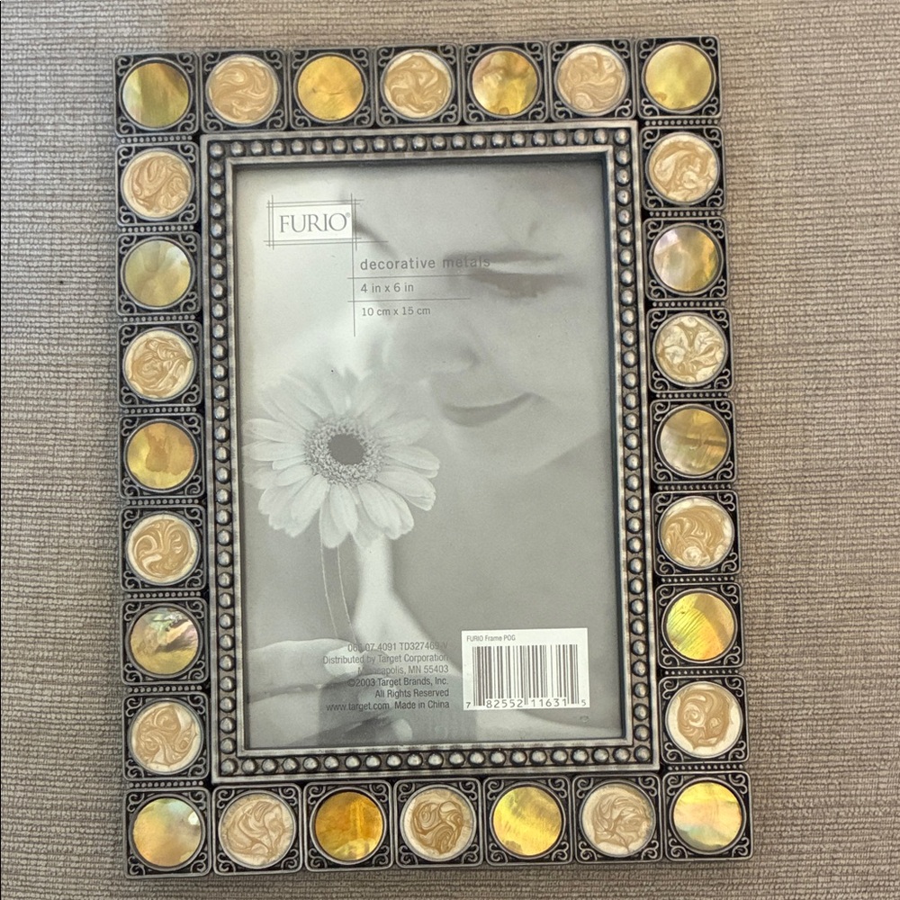 Furio Decorative Metals Standing Photo Frame with Accents holds 4”x 6” photo